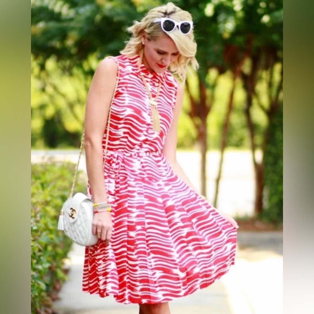 Cabi red and white sleeveless pleated drop waist dress with belt.